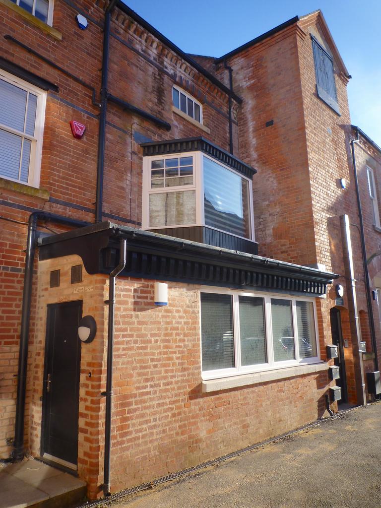 Entrance door and front elevation