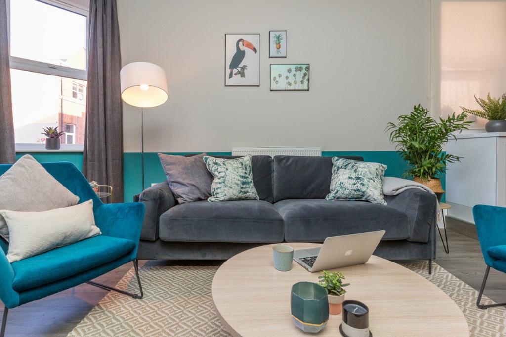 A bright and inviting large modern living room,...