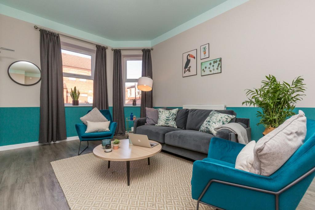 A spacious and stylish modern living room, perf...