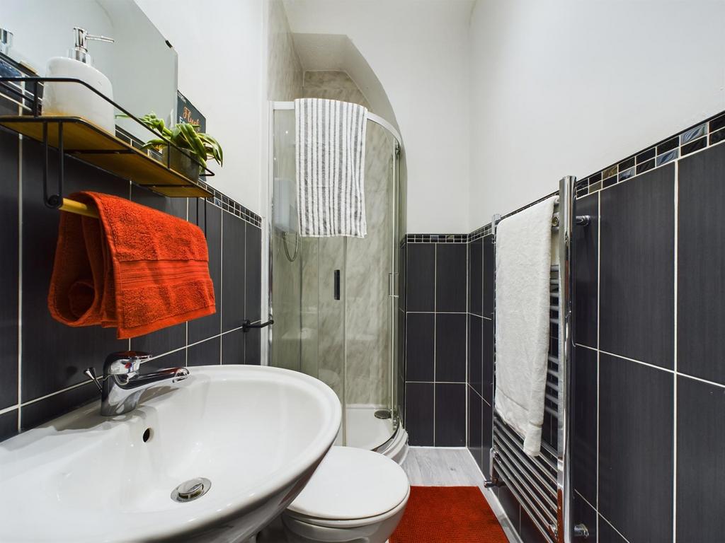 A modern and clean bathroom featuring stylish t...