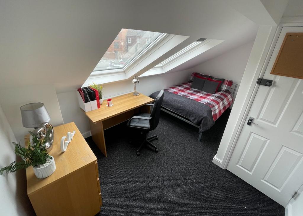 A spacious and bright large double bedroom with...