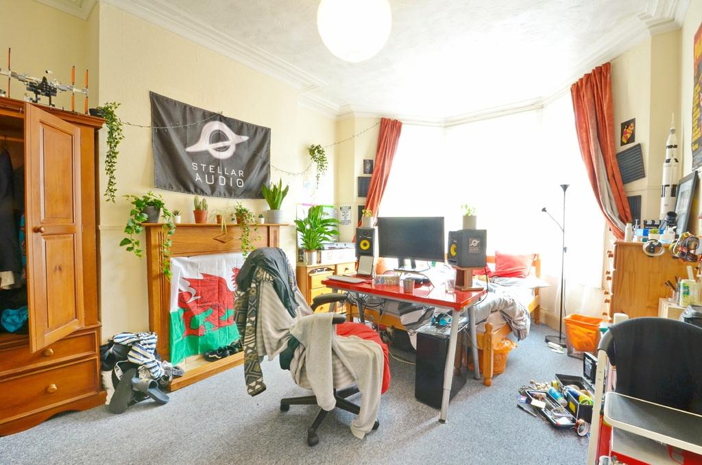 Bright, characterful living room with a large b...