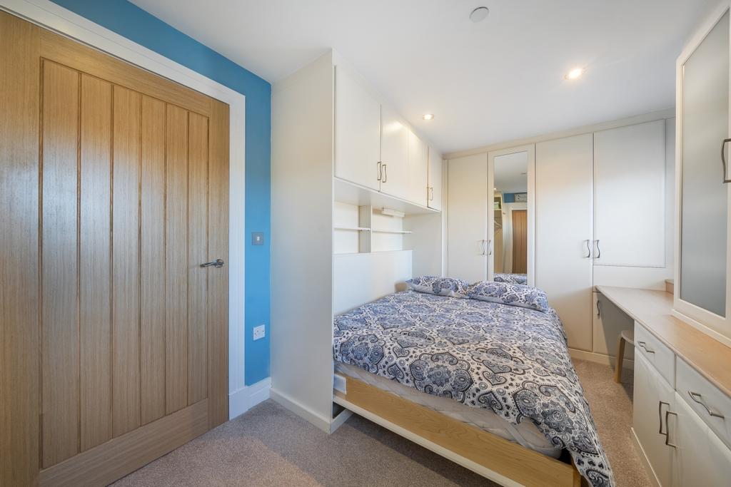 Bedroom 2 with stowaway bed made up