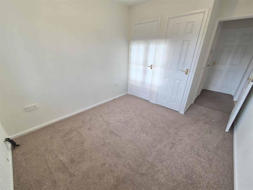 Bed 2 cupboards.jpg