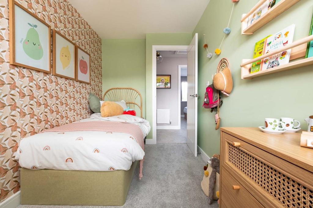 The third bedroom is perfect for a child's...