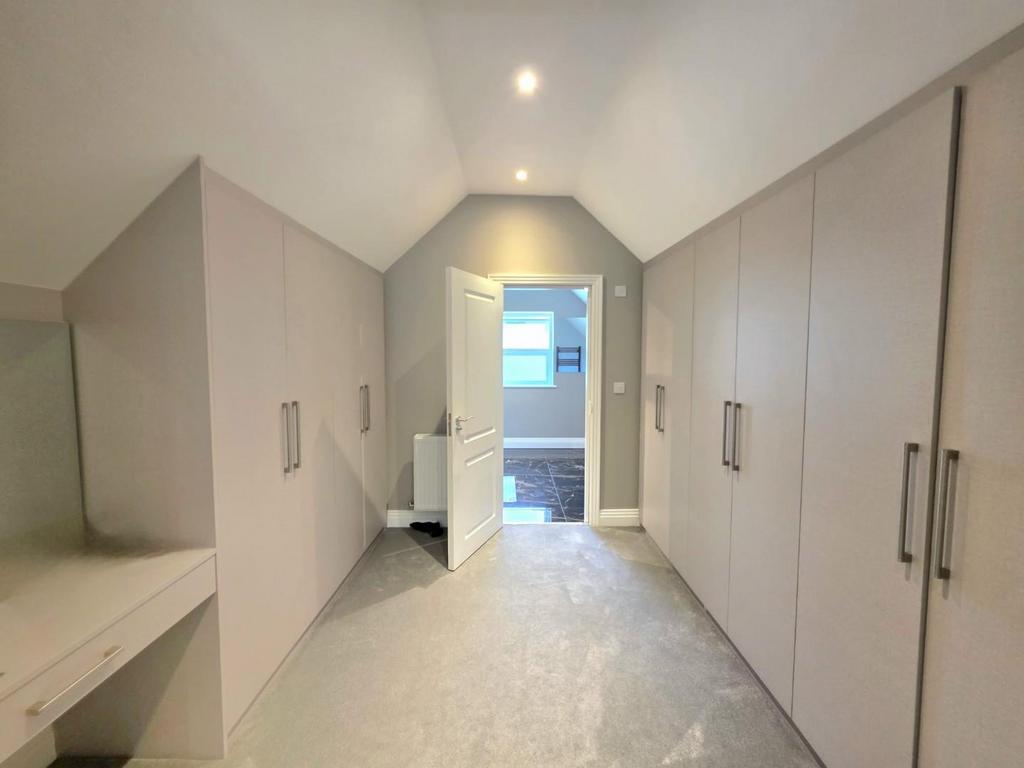 Loft room walk in cupboard.jpg