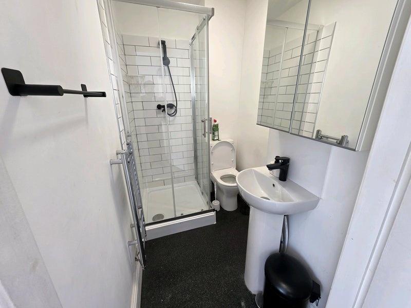 A modern and well-maintained bathroom featuring...
