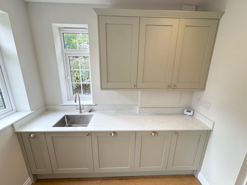 Fitted wall and base units, Corian worktops
