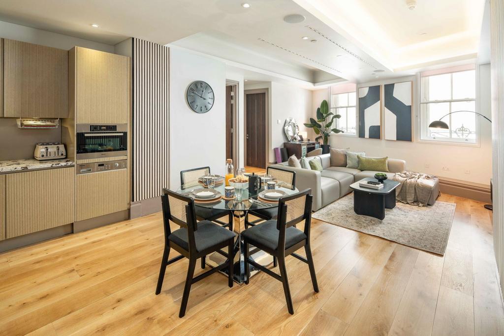 Bright open-plan living and dining area with wo...