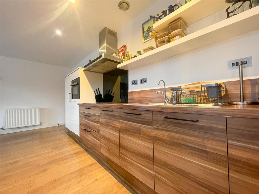 Open plan lounge kitchen dining room
