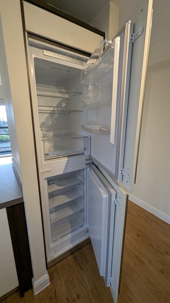 Integrated fridge freezer