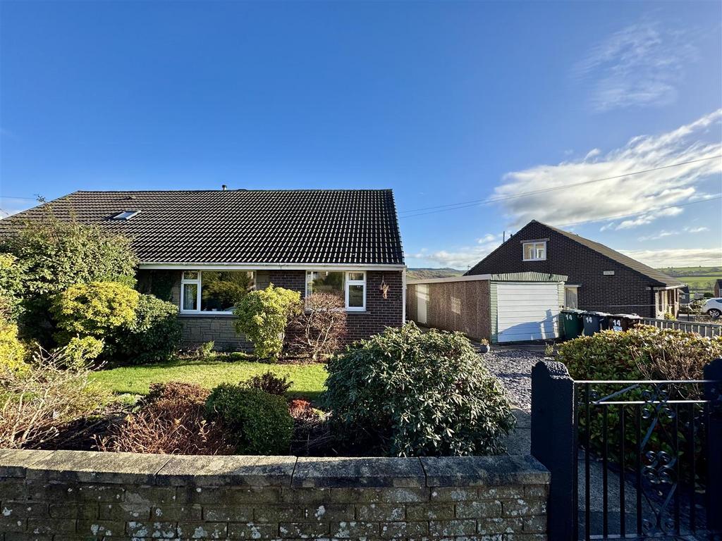 External front, garage and driveway