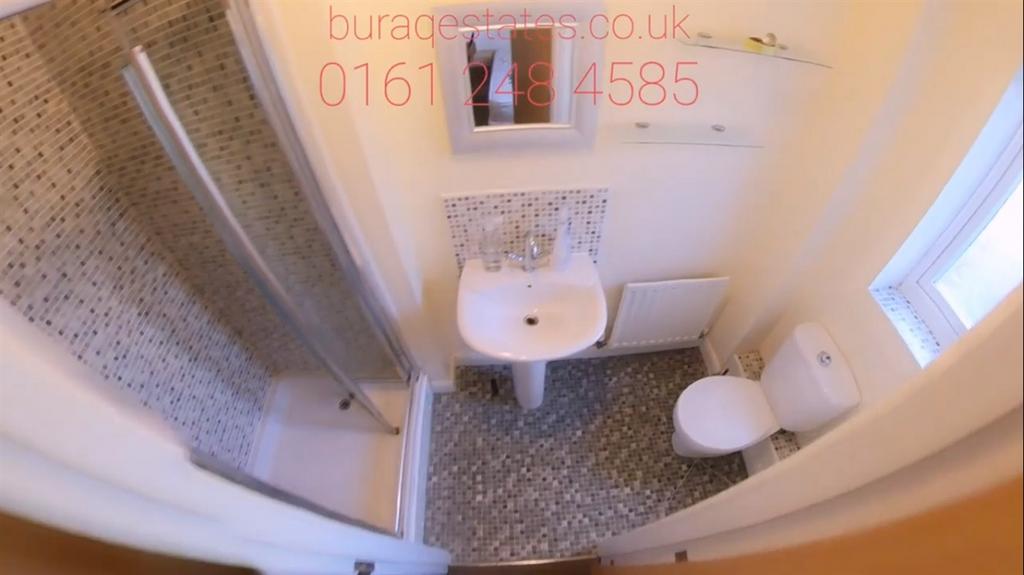Bright, tidy bathroom with a walk-in shower, wa...