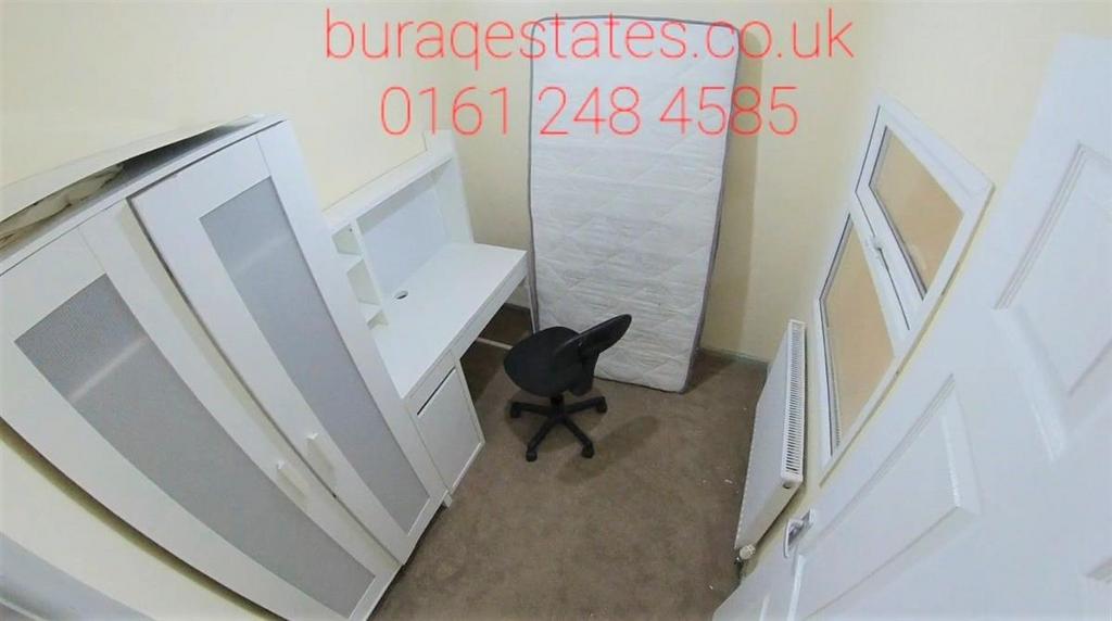 Compact bedroom with built-in storage, a work d...