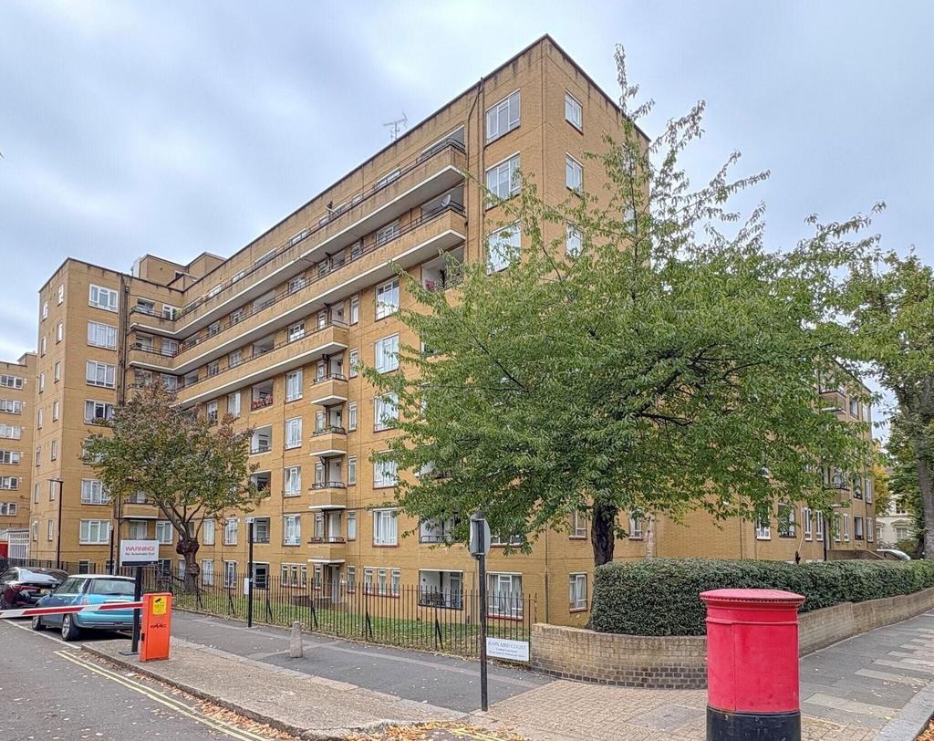 Attractive brick apartment block with balconies...