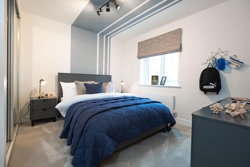 Bedroom 2 offers space for a double bed and...