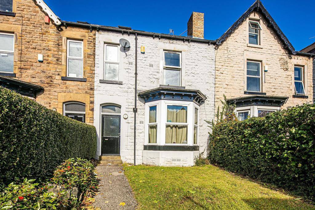 Attractive terraced house with a neat front law...