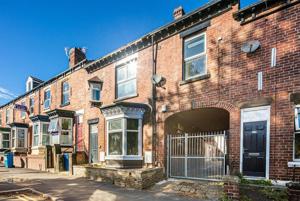 Attractive red-brick terraced property with bay...
