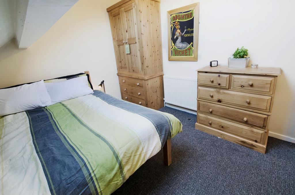 Bright, neatly presented bedroom with a comfort...