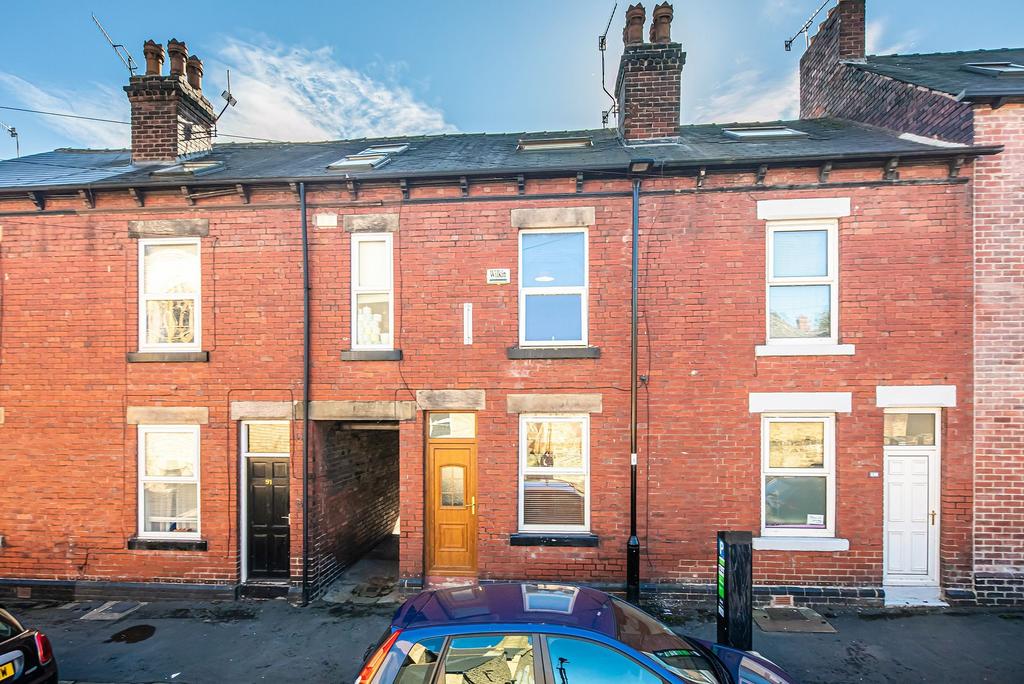Well-maintained red-brick terraced street view ...