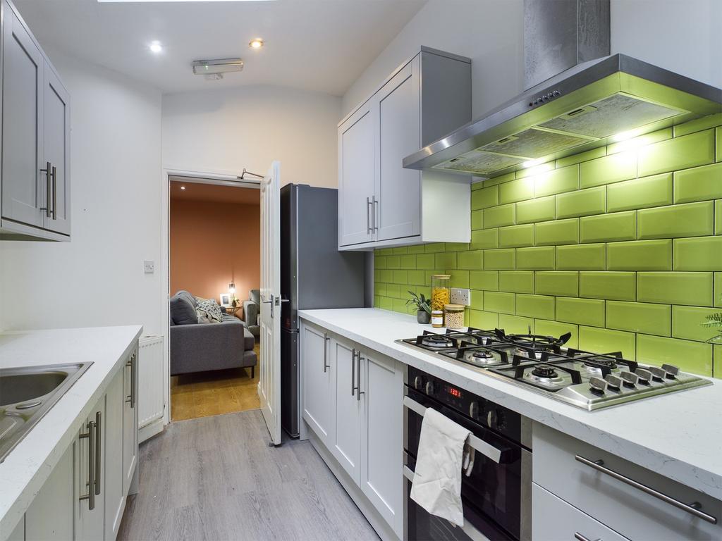 A modern and clean kitchenette featuring stylis...
