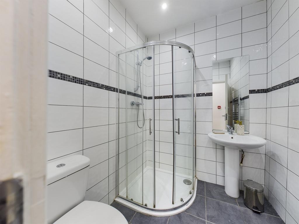 A modern and clean bathroom featuring a stylish...