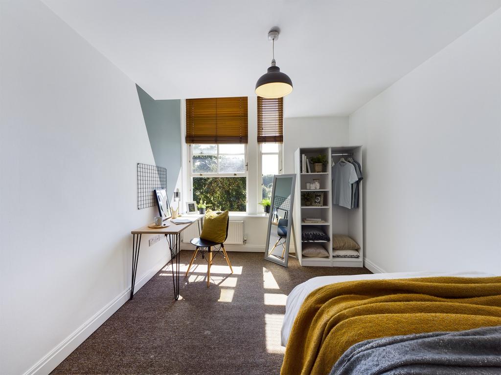 A spacious and inviting large double bedroom wi...