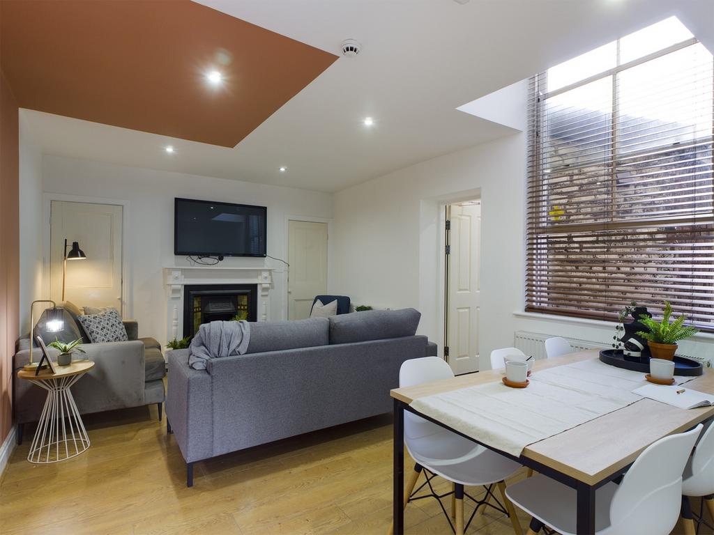A spacious and stylish modern living room, perf...