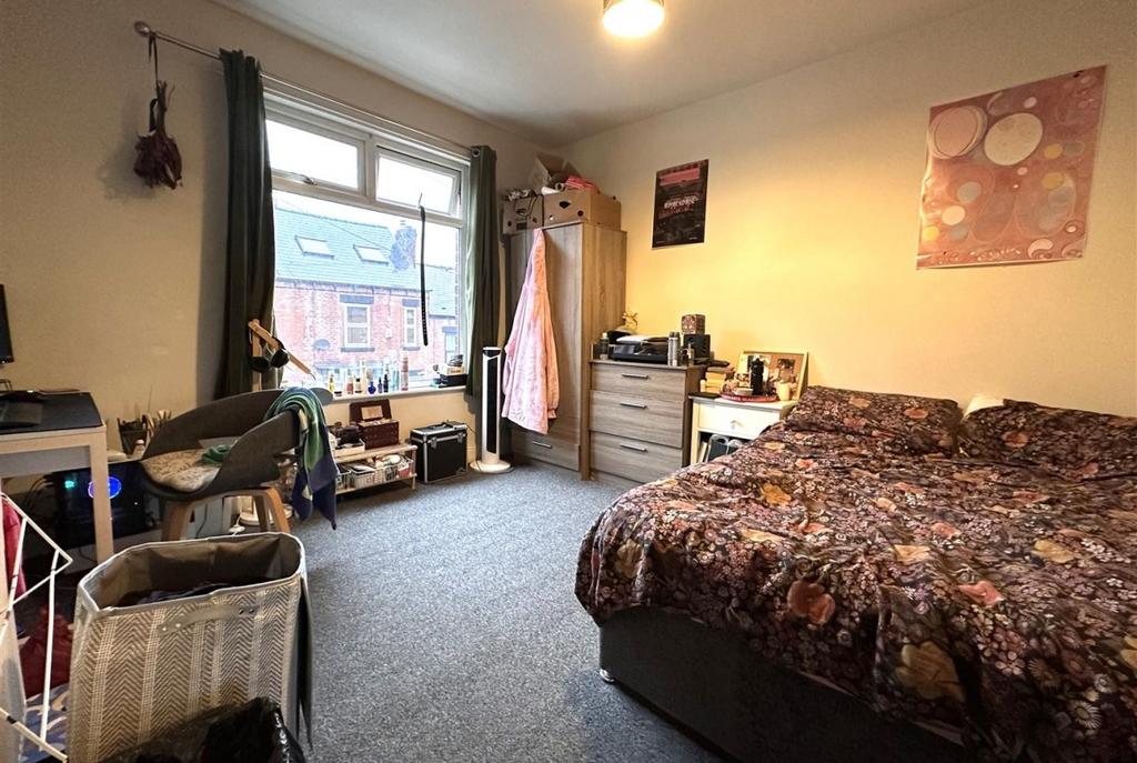 Bright, well-presented bedroom with a large win...