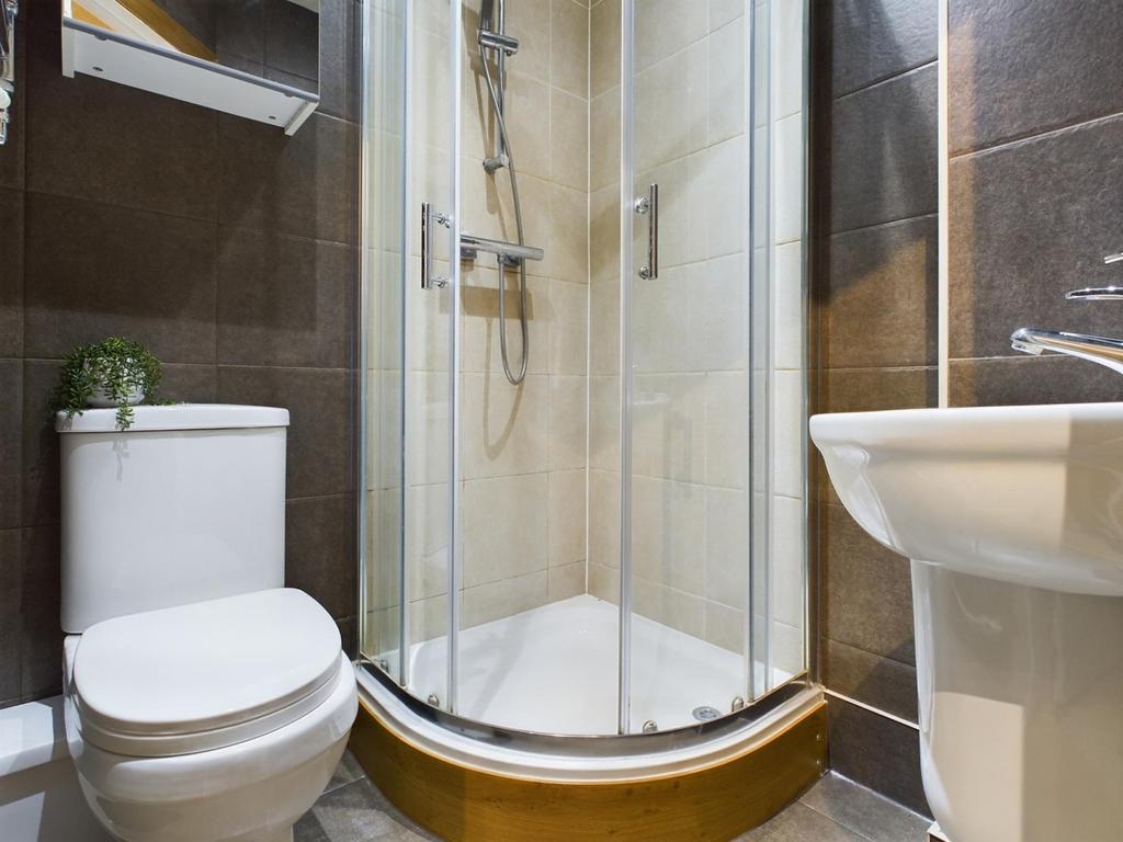 A modern and clean bathroom featuring a stylish...