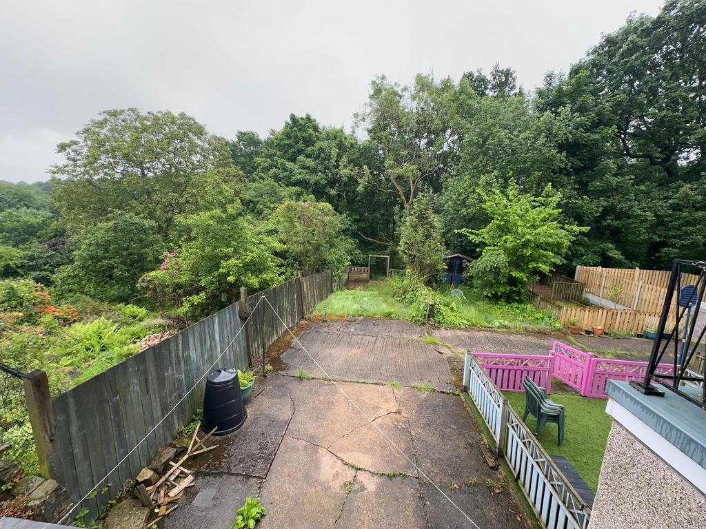 Private rear garden backing onto mature woodlan...