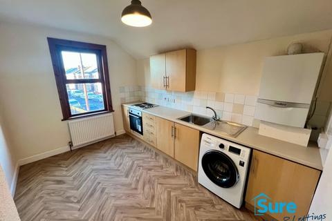 undefined, Tredworth Road. GL1