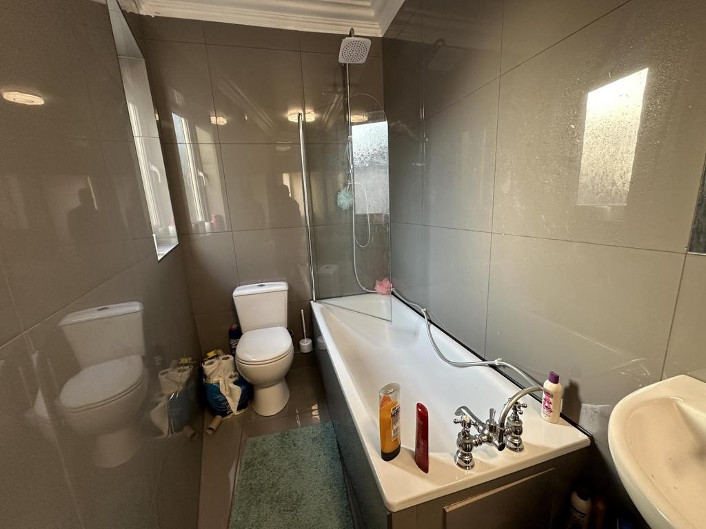 A modern, well-maintained bathroom featuring a ...