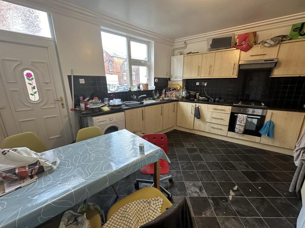 A functional kitchen with ample workspace and n...