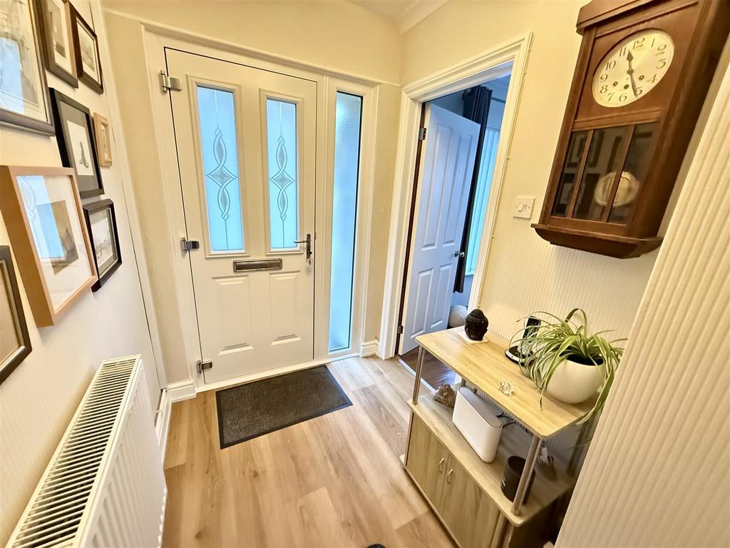FRONT ENTRANCE DOOR to ATTRACTIVE HALLWAY