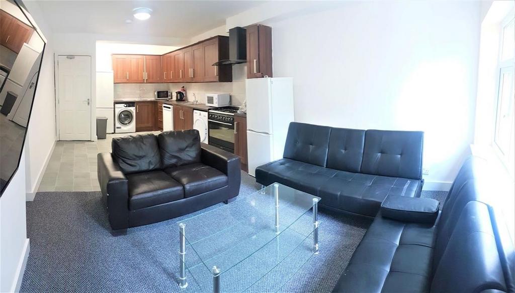 Bright, open-plan living space with modern seat...