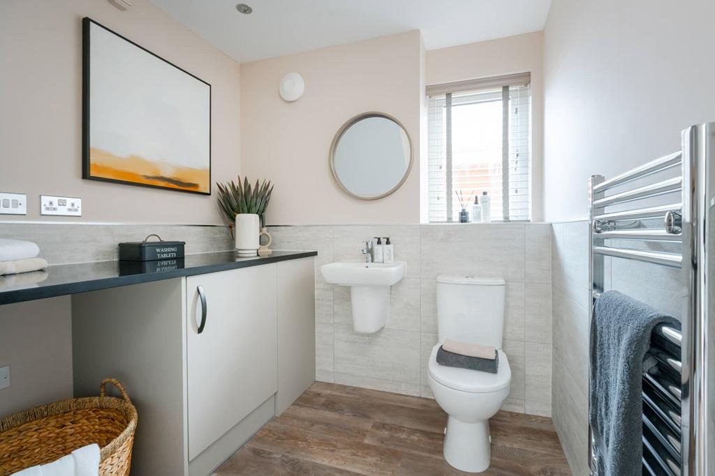 A downstairs toilet & utility room adds...