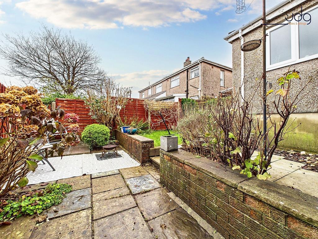 Tiered Garden with a mixture of flags, decking...