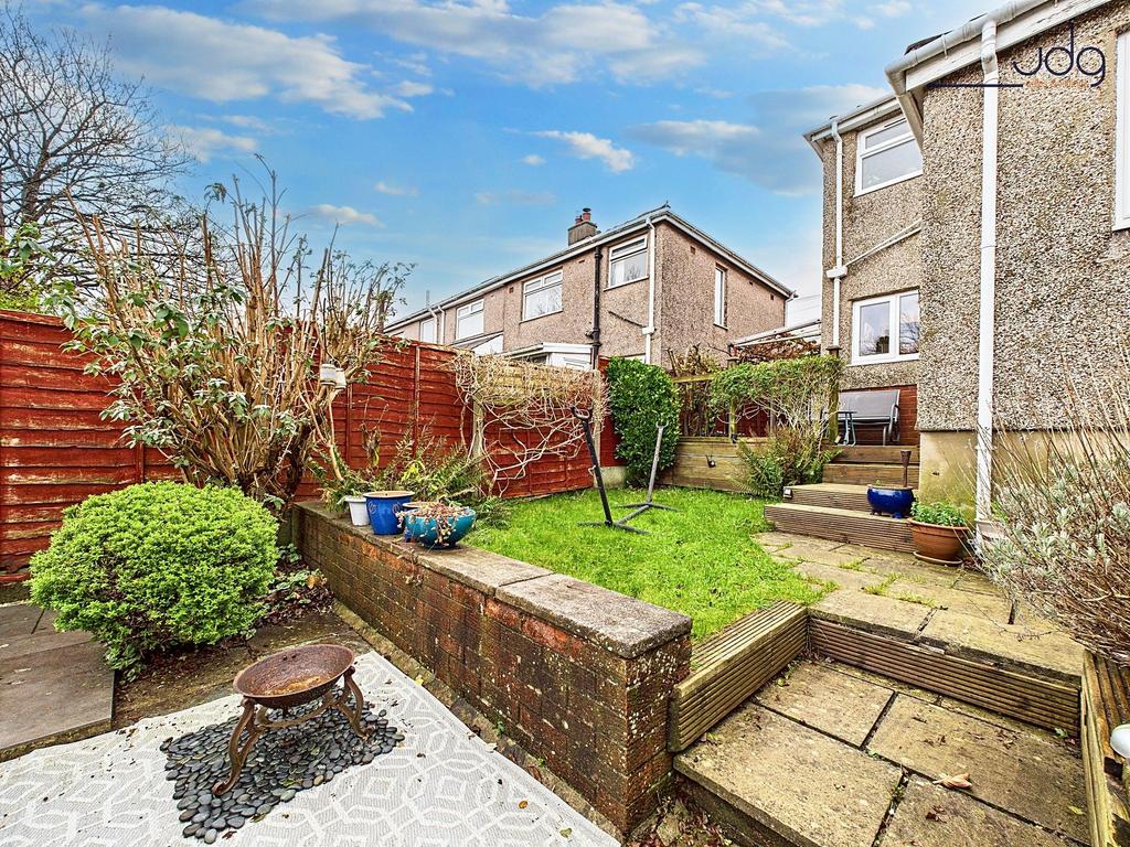 Tiered Garden with a mixture of flags, decking...