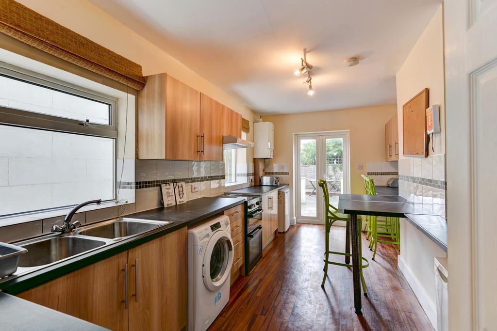 A bright and well-maintained kitchen featuring ...