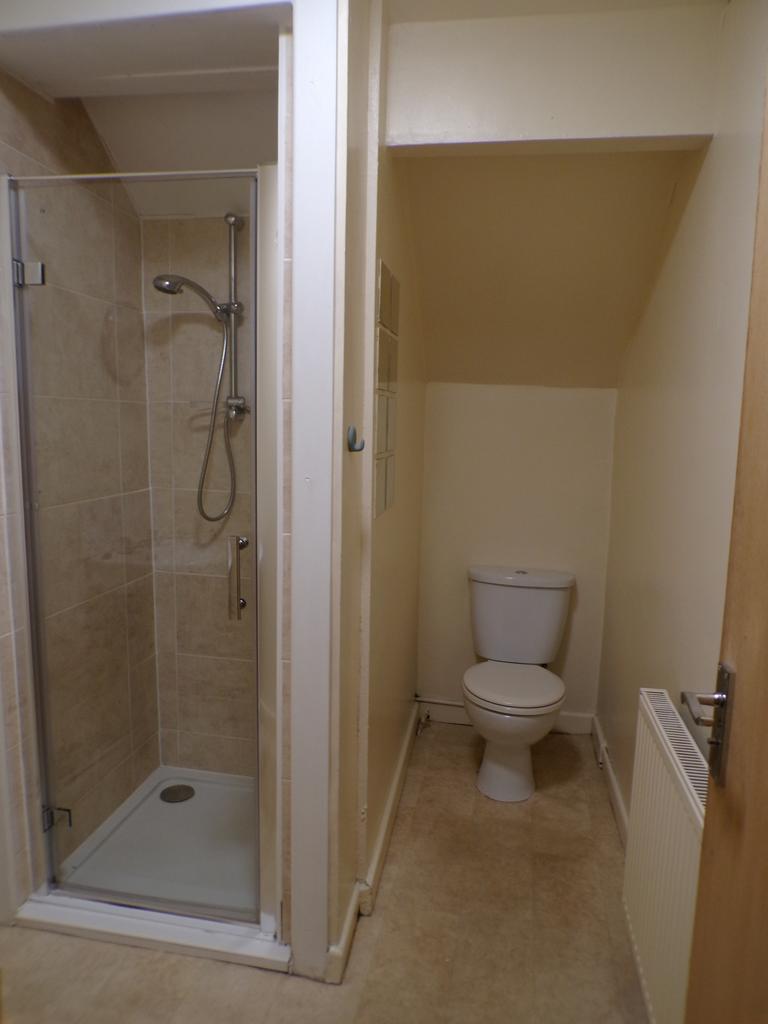 A tidy and functional bathroom featuring a mode...