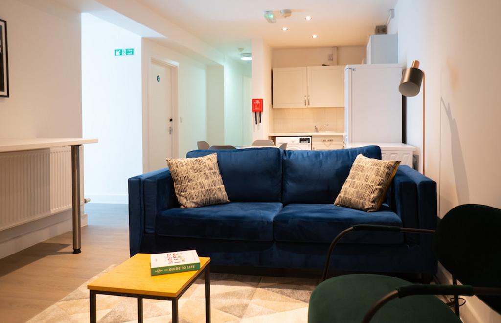 A spacious and inviting modern living room, per...