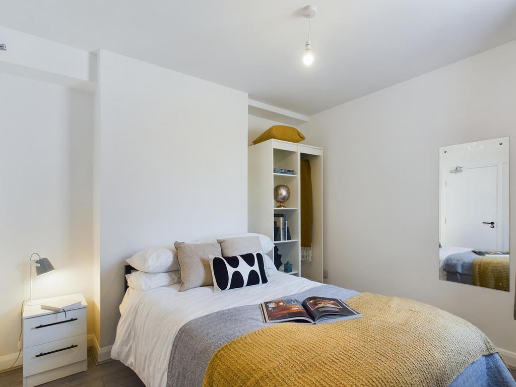 A bright and inviting double bedroom, perfect f...