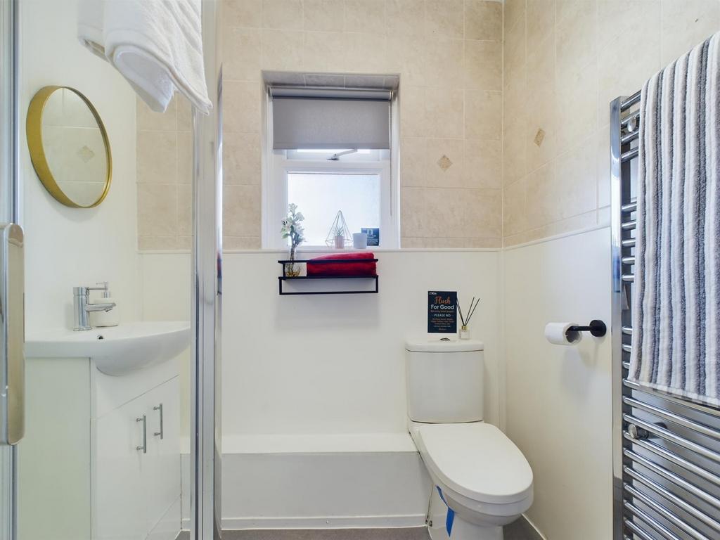 A modern and clean bathroom featuring bright li...