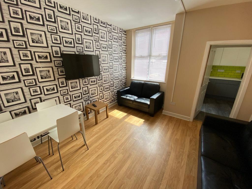 A spacious and bright modern living room with s...