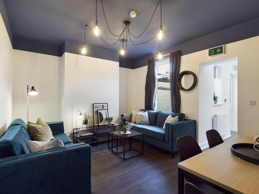 A spacious and stylish modern living room, perf...