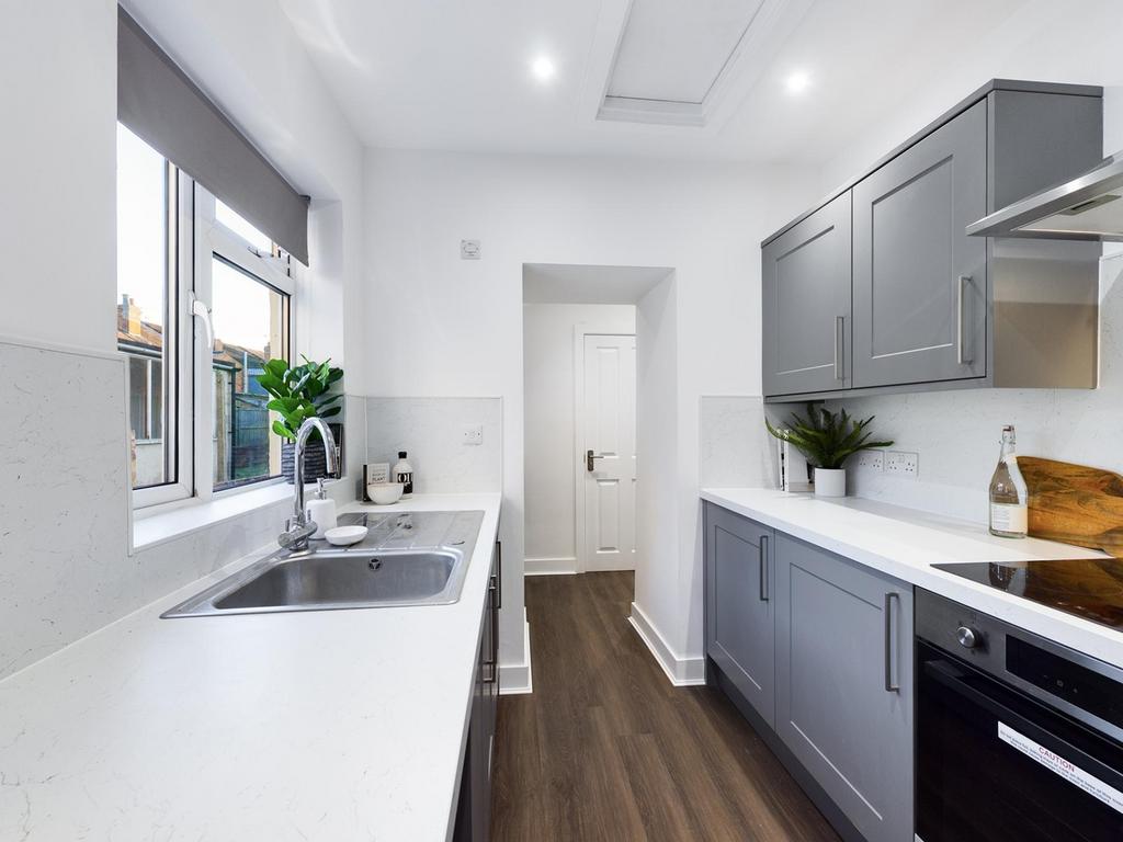A stylish and well-equipped kitchenette with mo...