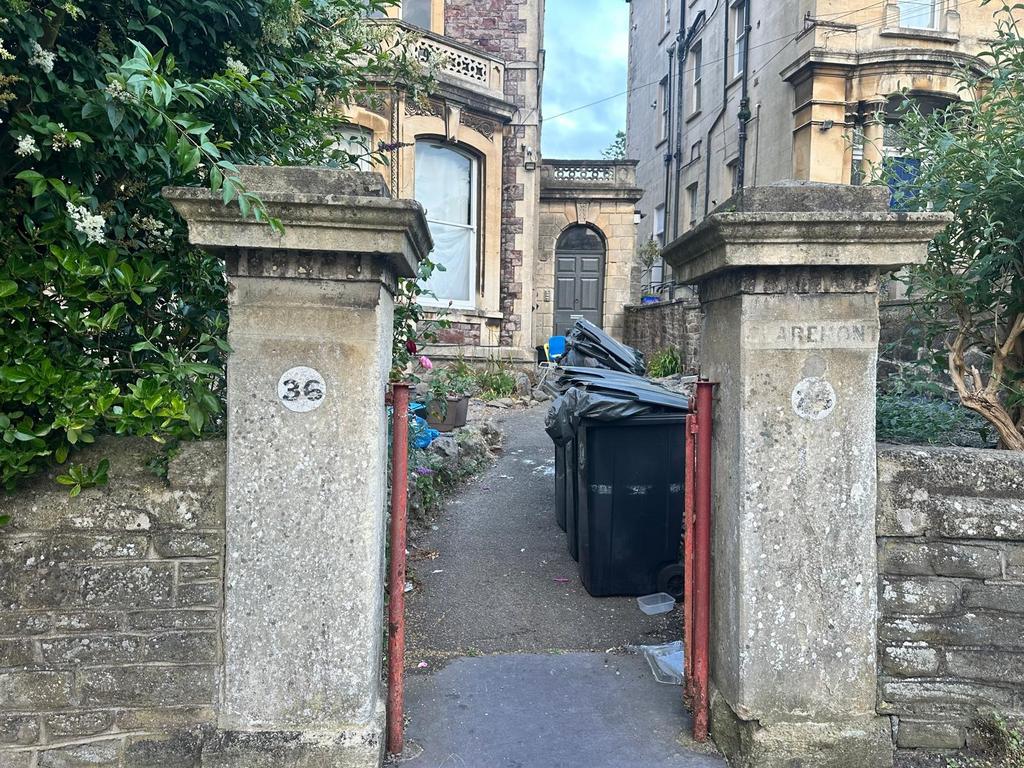 Attractive stone entrance with decorative pilla...