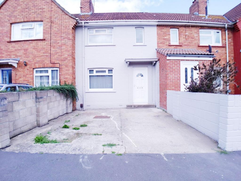 Terraced house exterior with private paved driv...
