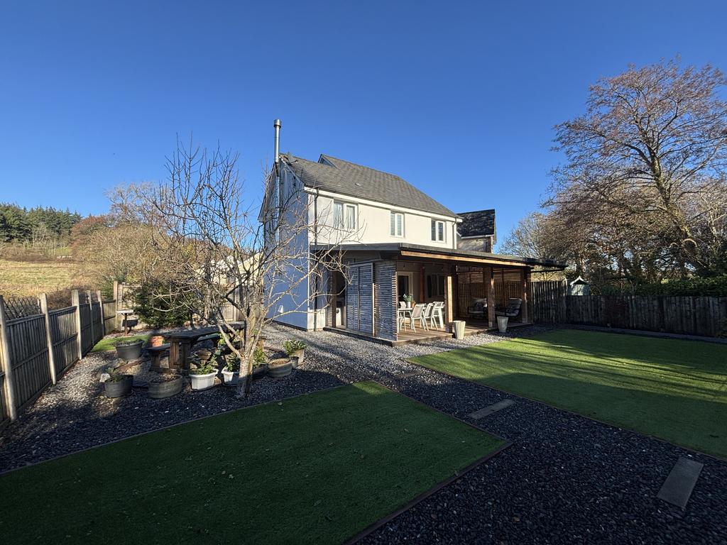 Rear garden (first image)
